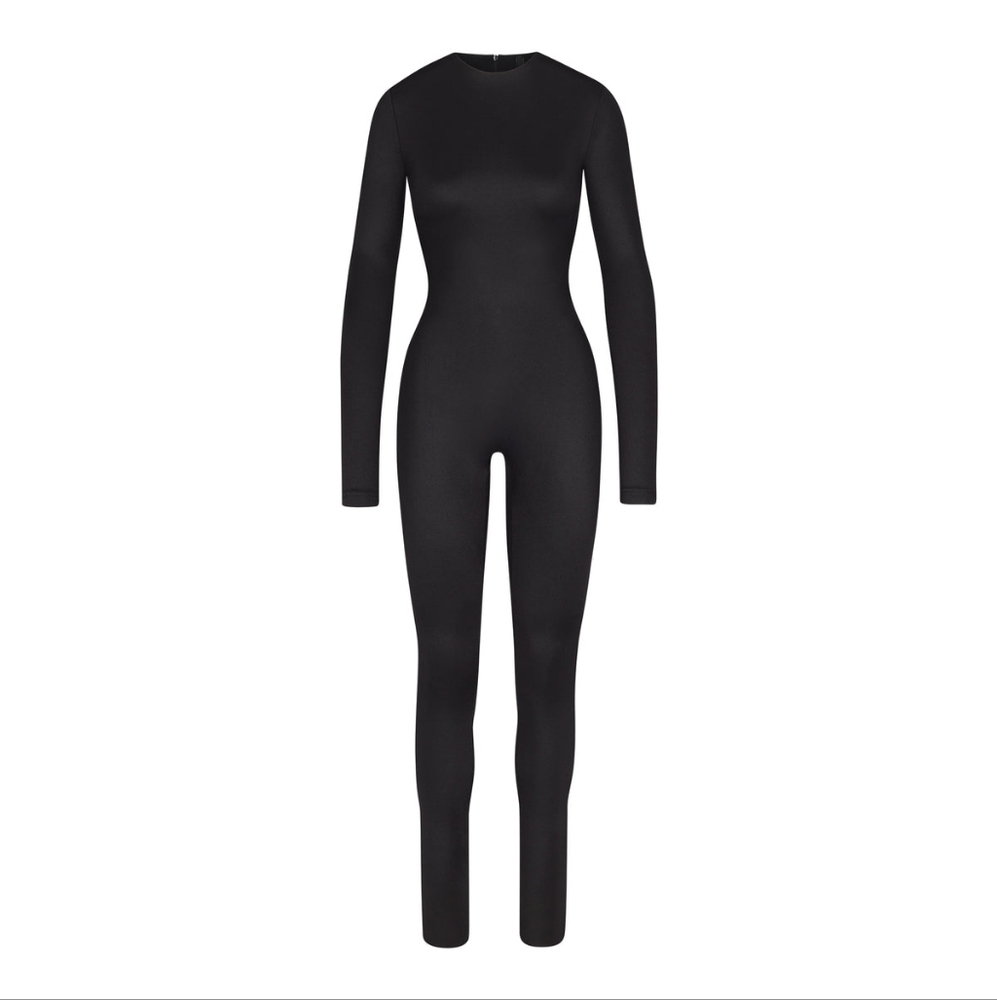 SOLD SKIMS ALL-IN-ONE SHINE CREW NECK LONG SLEEVE ONESIE